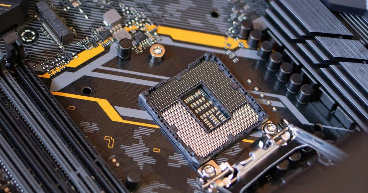 Close-up of a server motherboard showing CPU socket and RAM slots